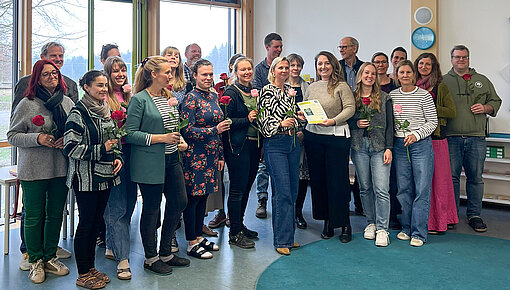 Gruppenfoto mit Pädagogen und Mitgliedern des MD